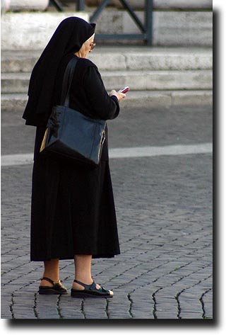 Nun with cellphone