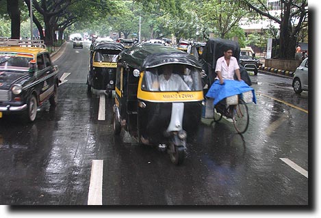 Rickshaws and taxis scooting around Mumbai